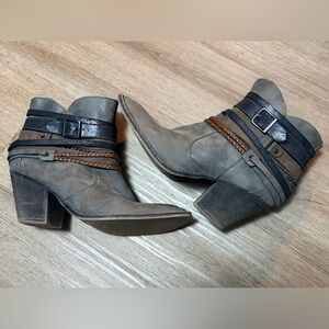 Super cute braided and buckled women’s booties